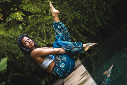 Airy harem pants with an elephant pattern in turquoise with pockets