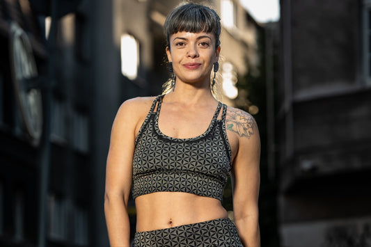Yoga top with the pattern of the flower of life olive green