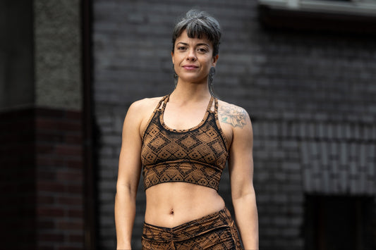 Yoga top with the pattern of the flower of life olive green