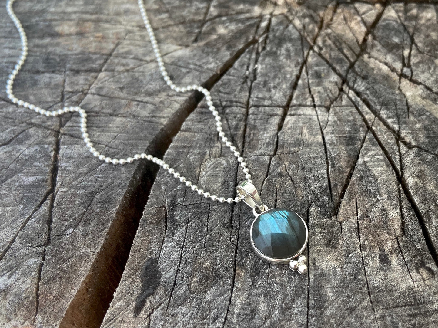 round faceted labradorite pendant with silver beads