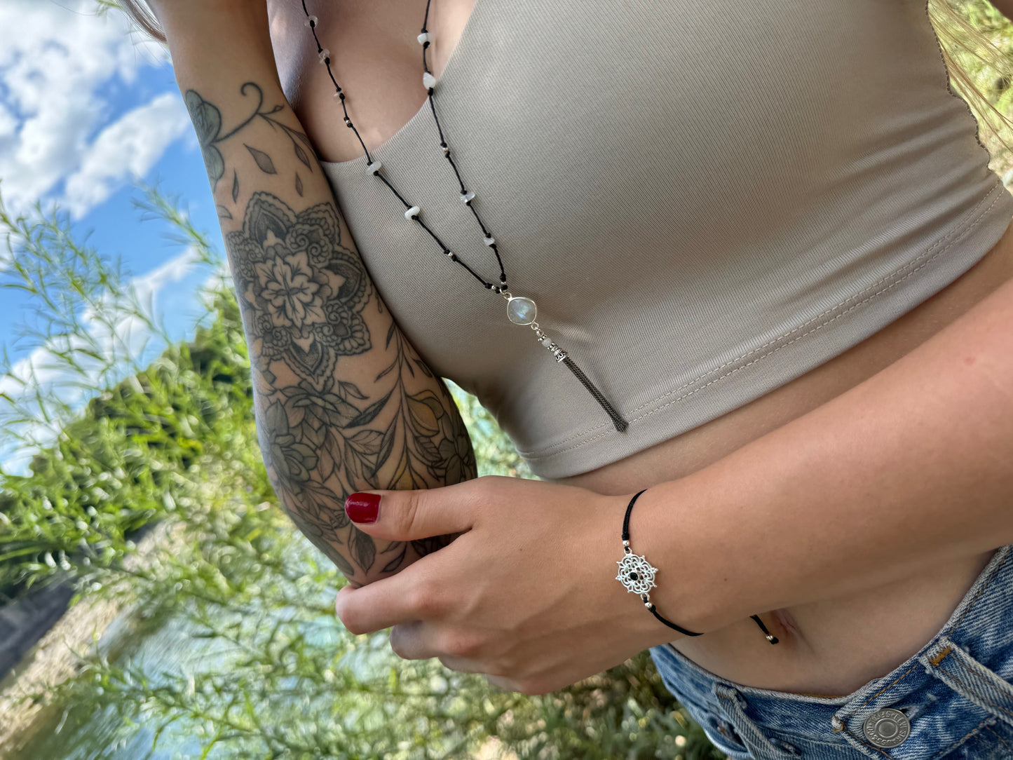 Silver necklace with small tourmaline stones and flowers