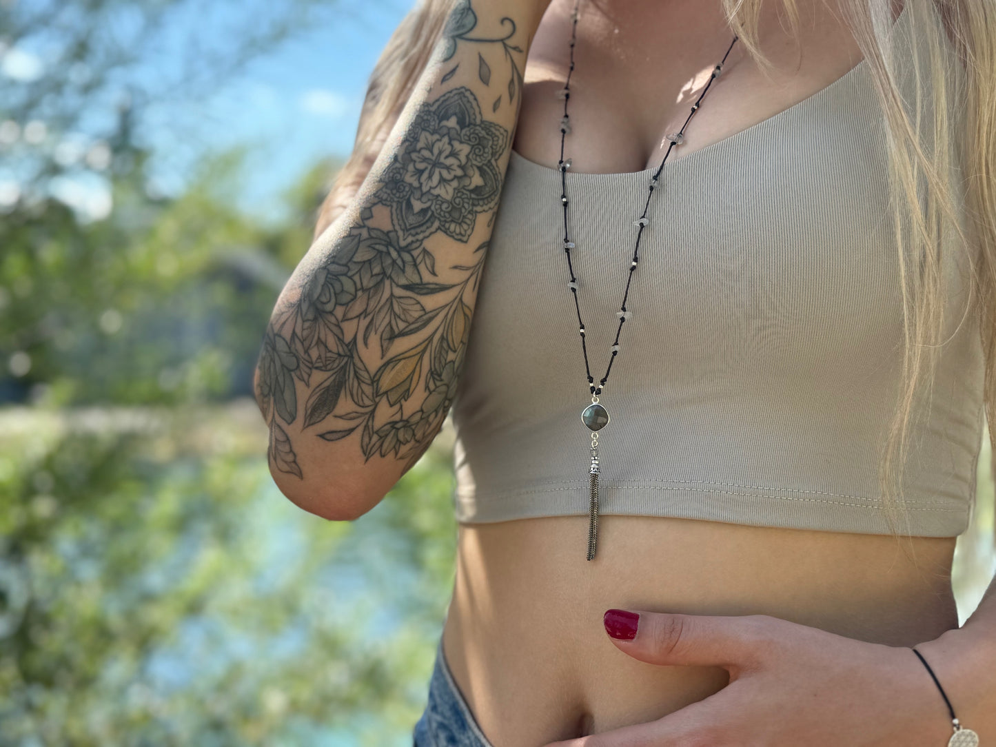 Silver necklace with small tourmaline stones and flowers