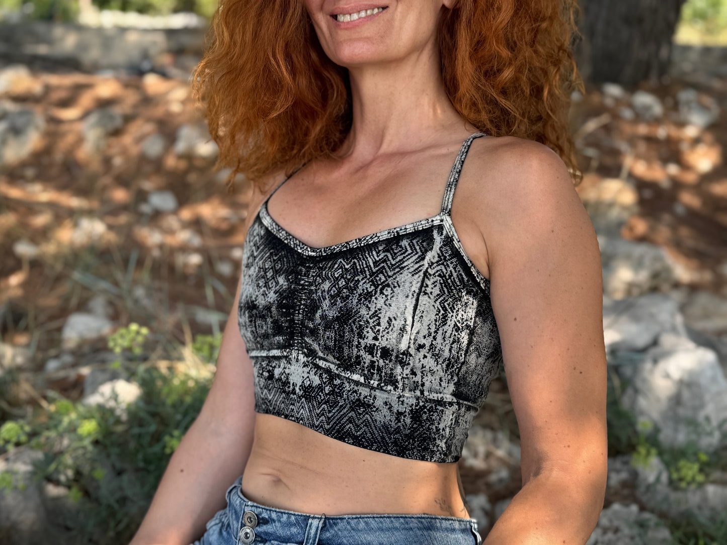 Yoga top with the pattern of the flower of life olive green