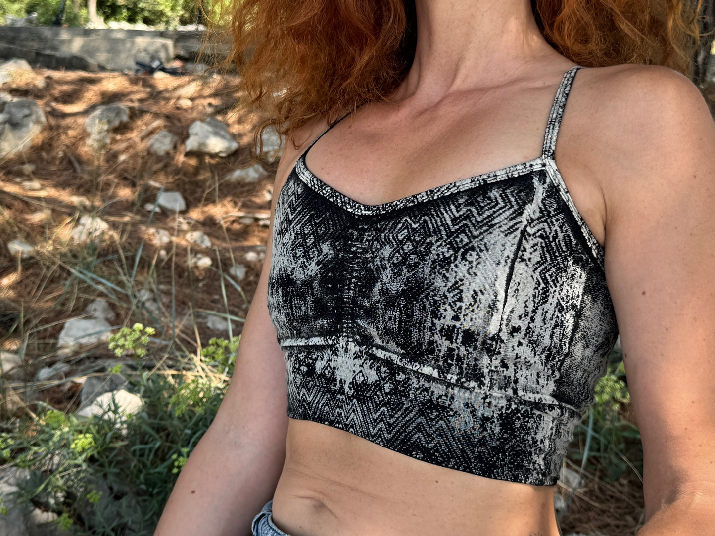 Yoga top with the pattern of the flower of life olive green