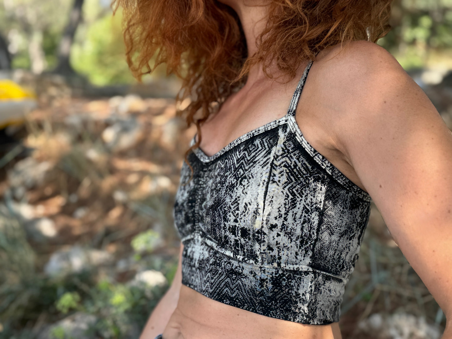 Yoga top with the pattern of the flower of life olive green