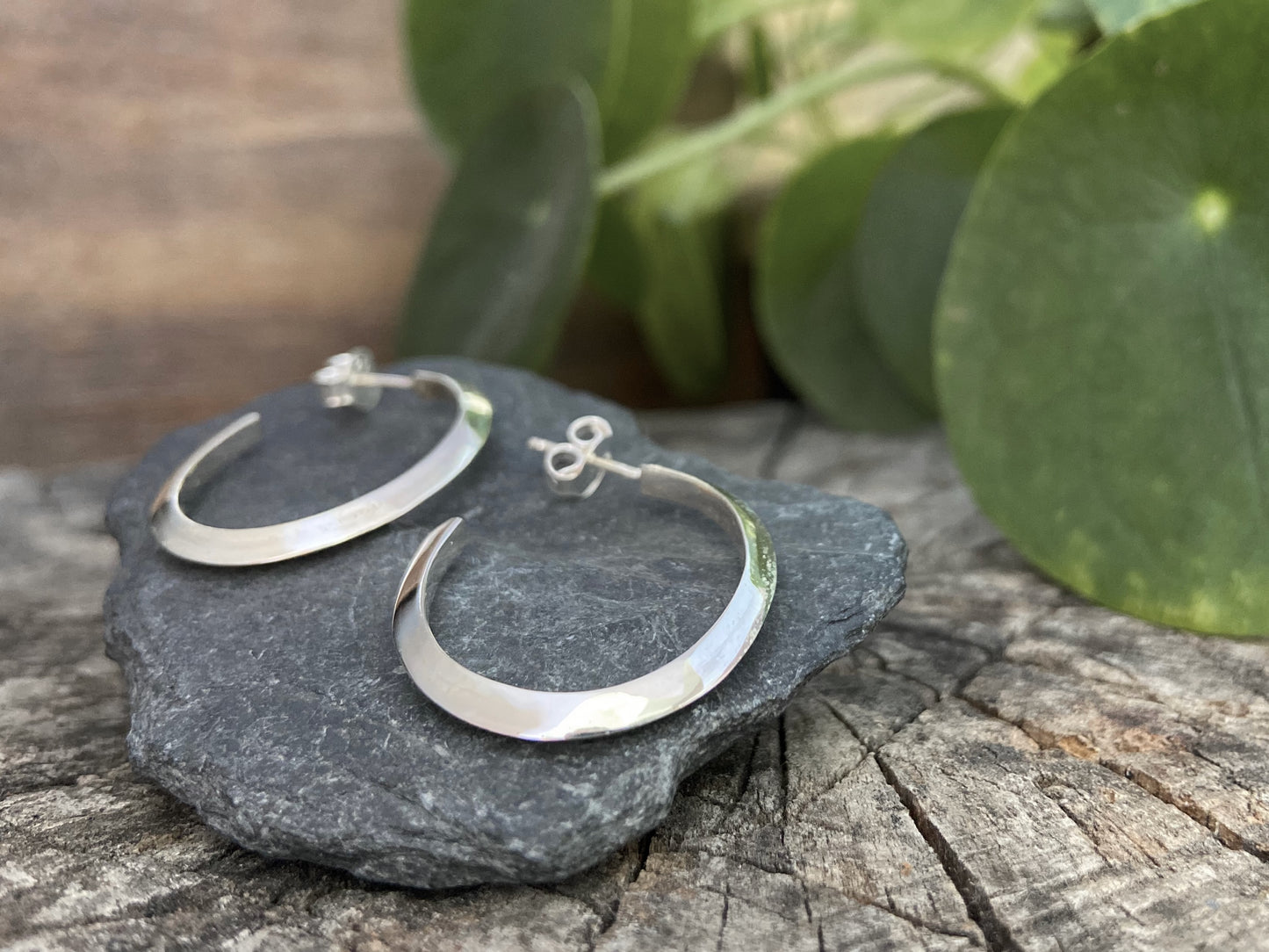 large, oval, simple hoop earrings made of silver, earrings