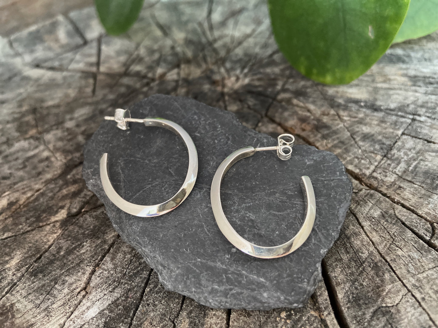large, oval, simple hoop earrings made of silver, earrings