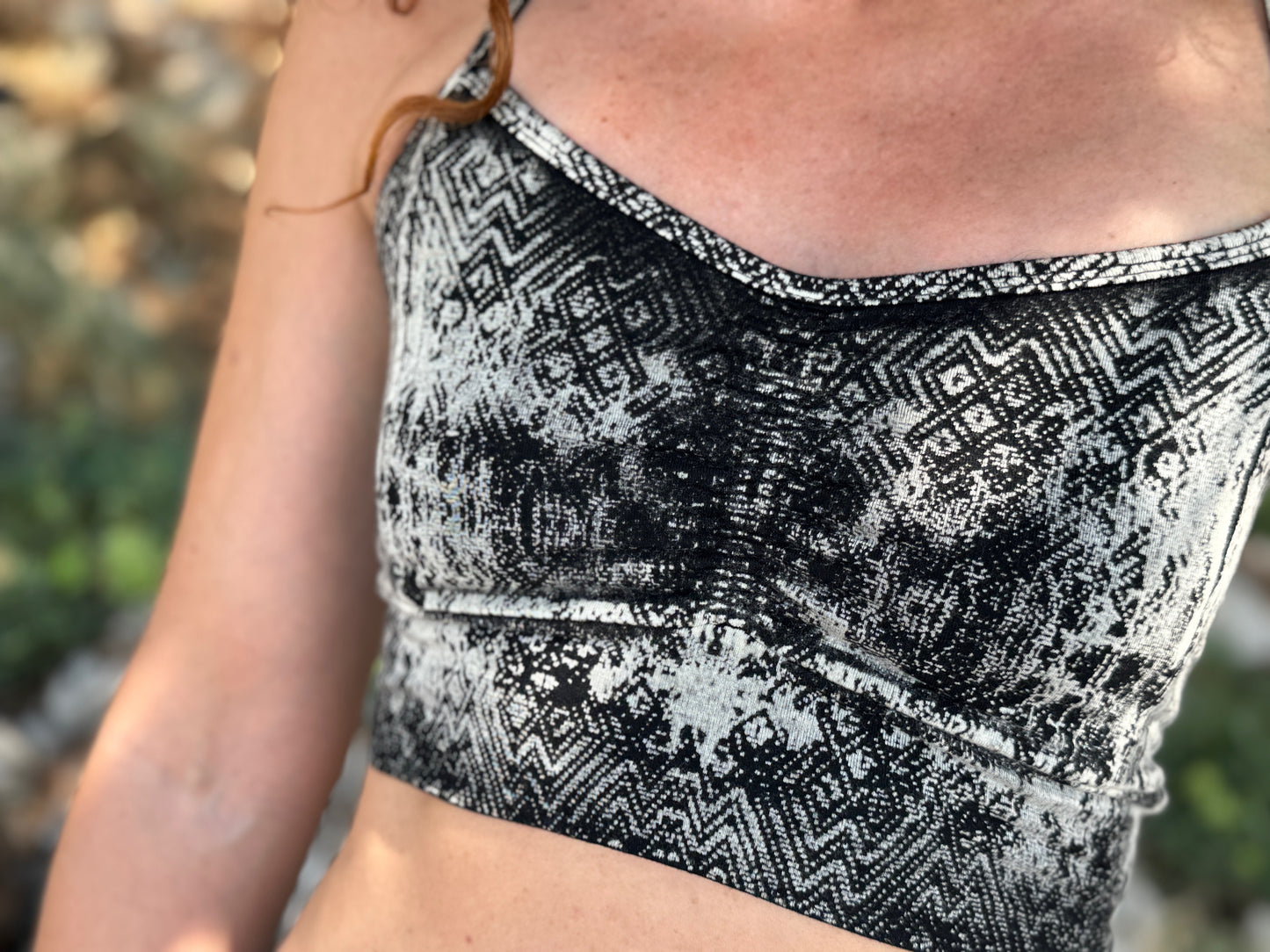 Yoga top with the pattern of the flower of life olive green