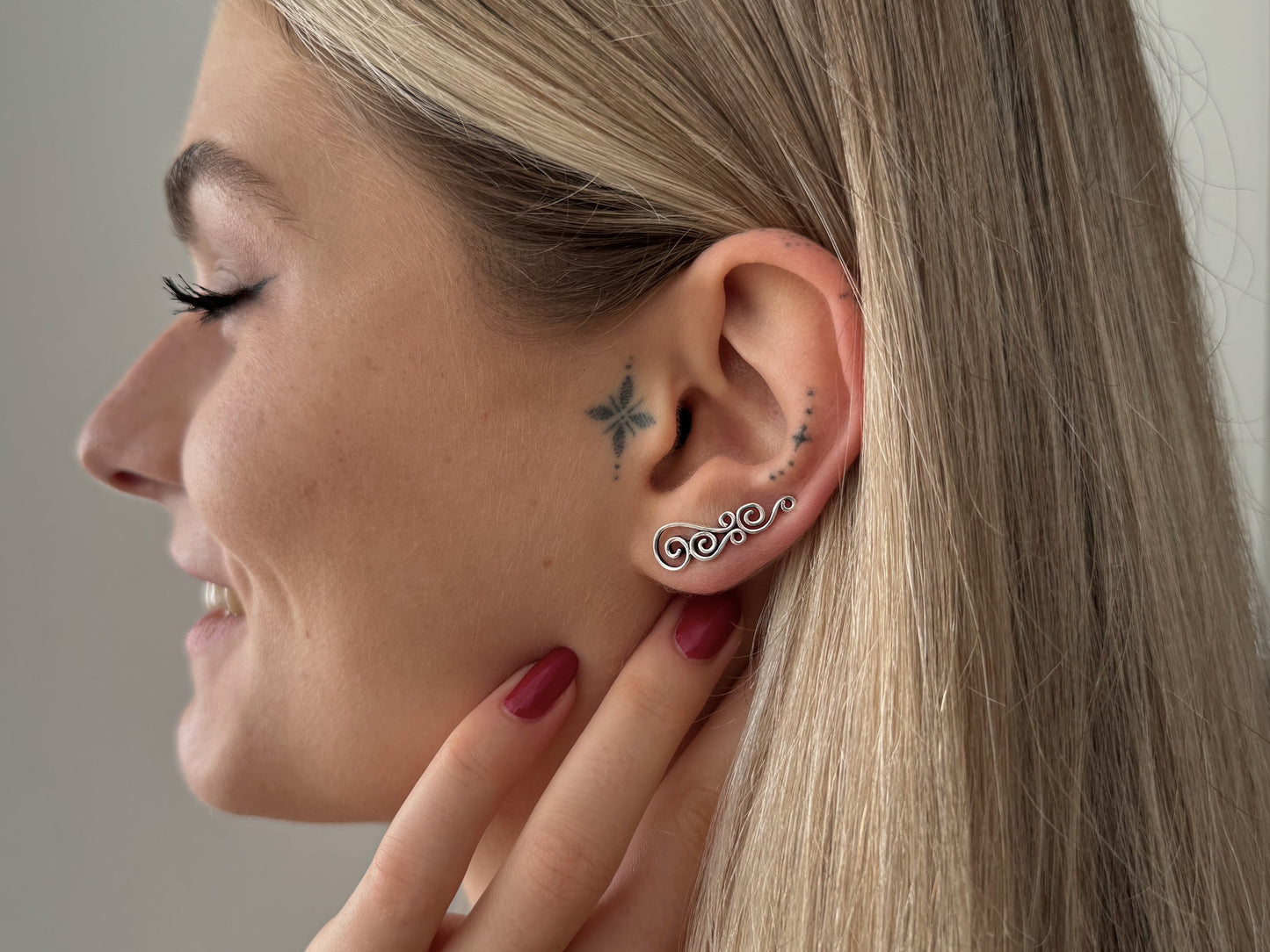 Earclimber earrings with silver spirals