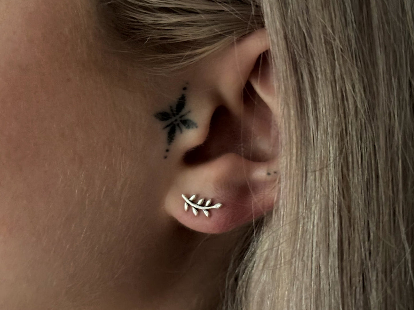 small angel wing stud earrings made of silver