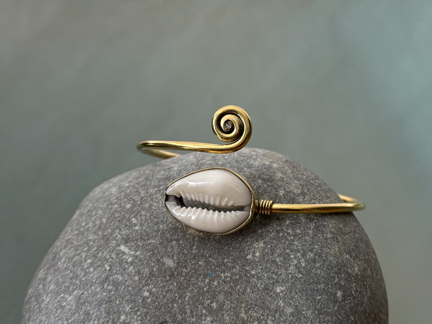 colorful bracelet with small pendants and brass beads