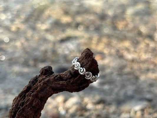 Toe ring with silver spirals