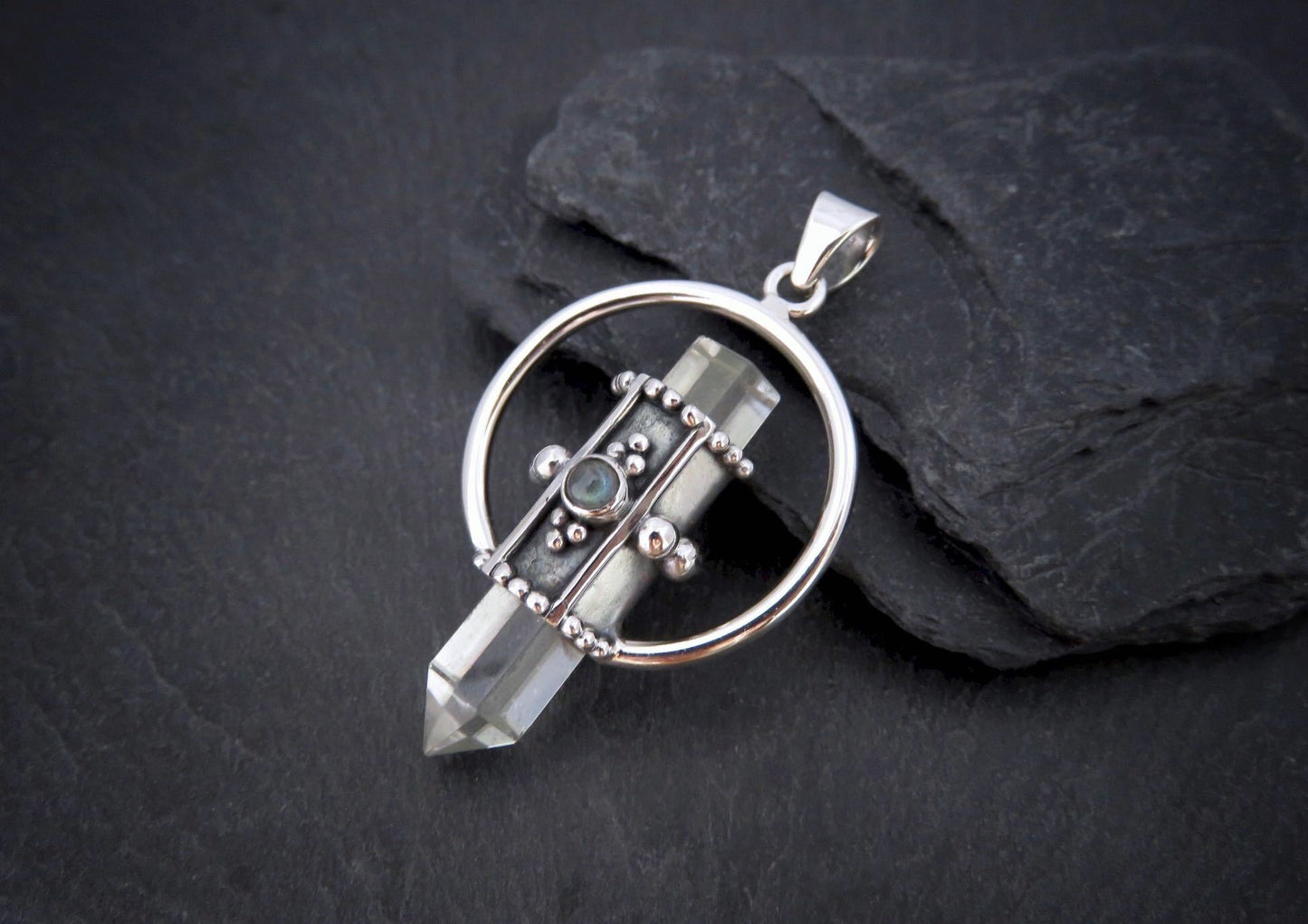 Rock crystal pendant with small stone made of silver