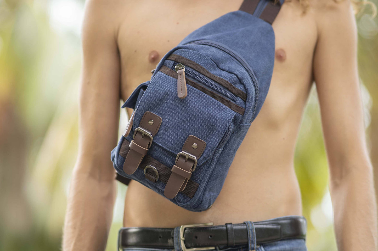 practical canvas shoulder bag with straps in blue