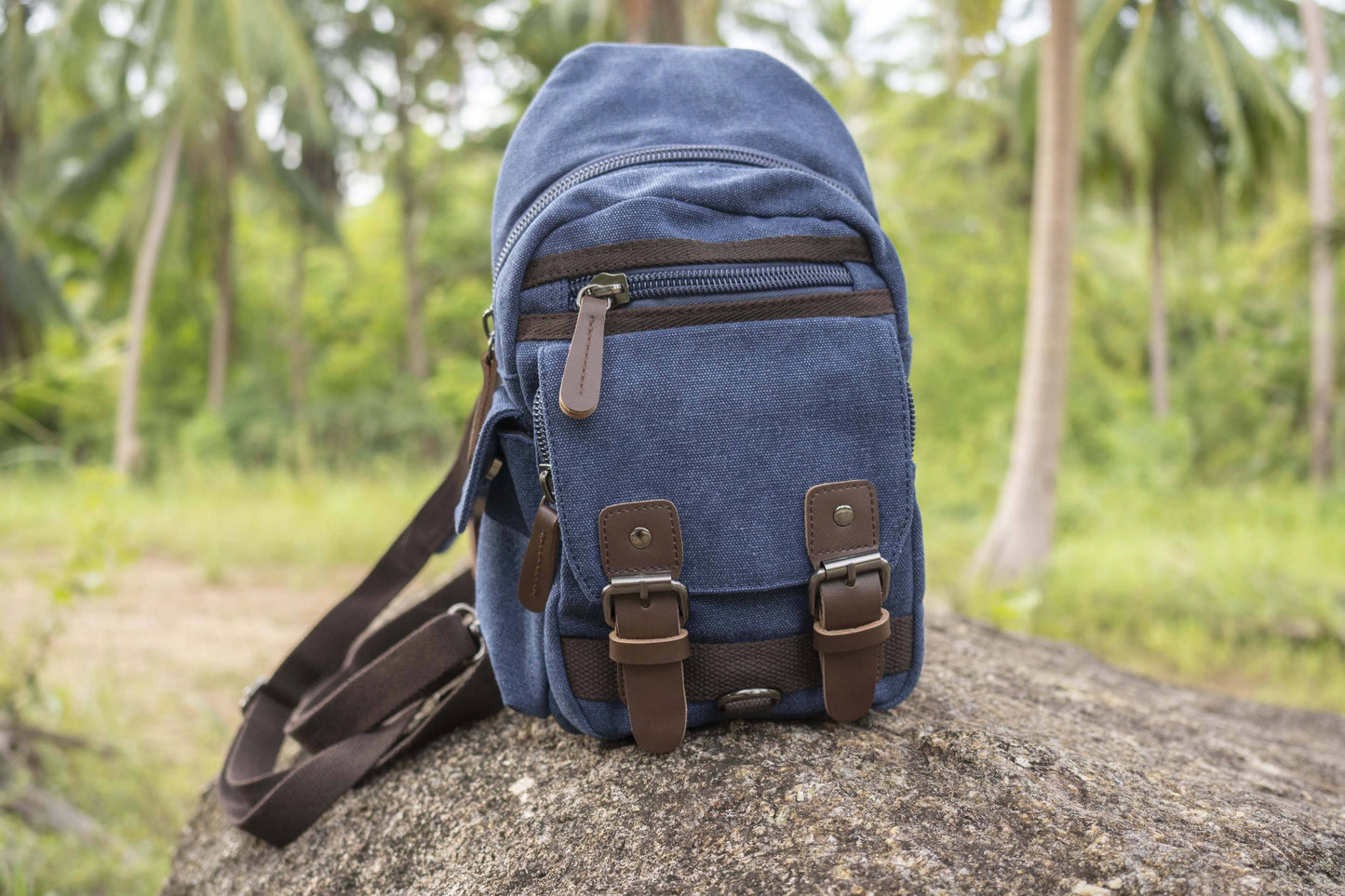 practical canvas shoulder bag with straps in blue