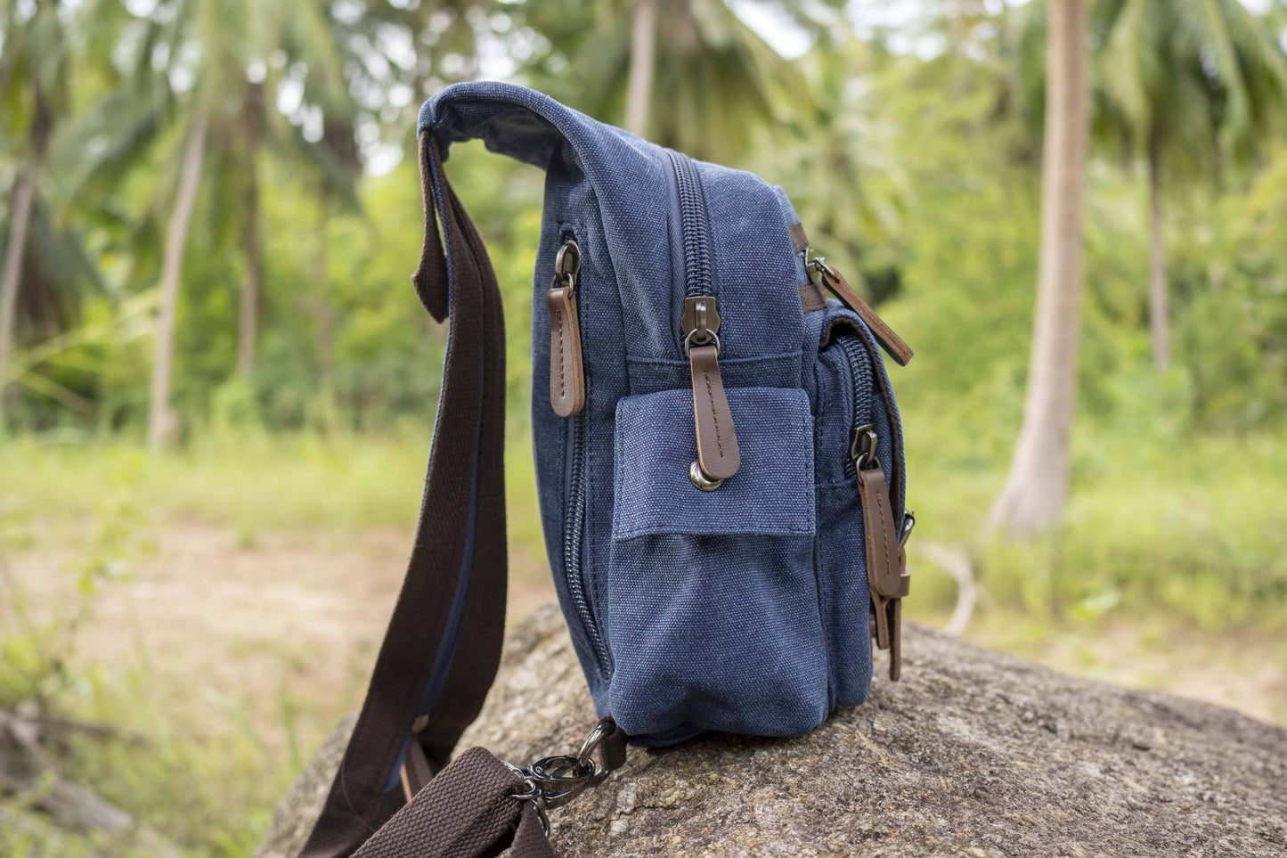practical canvas shoulder bag with straps in blue