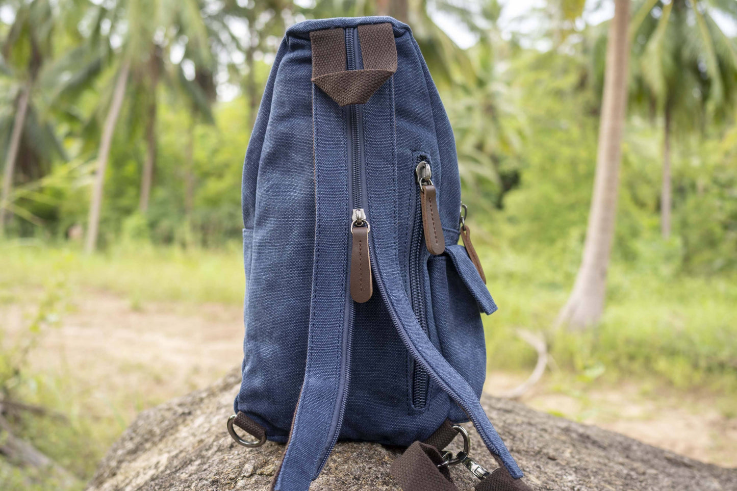 practical canvas shoulder bag with straps in blue