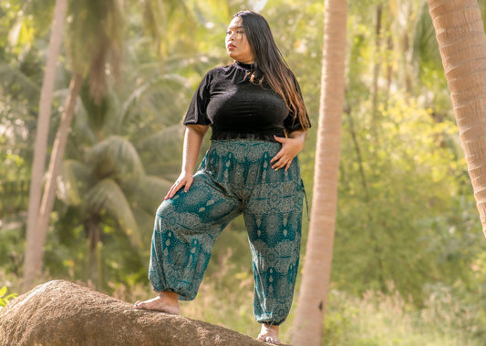 PLUS SIZE harem pants with a delicate pattern in turquoise
