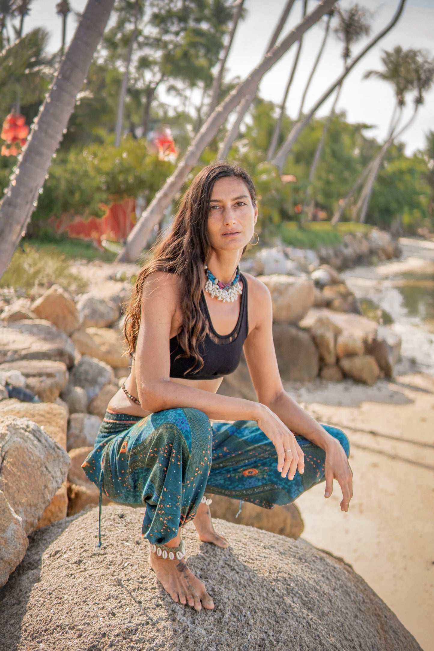 luftige Pluderhose mit Pfauenmuster in türkis