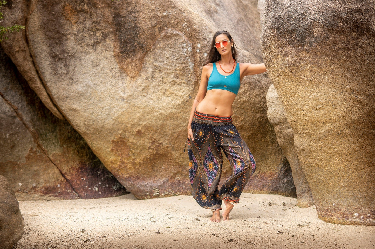 colorfully patterned harem pants with pockets in dark blue
