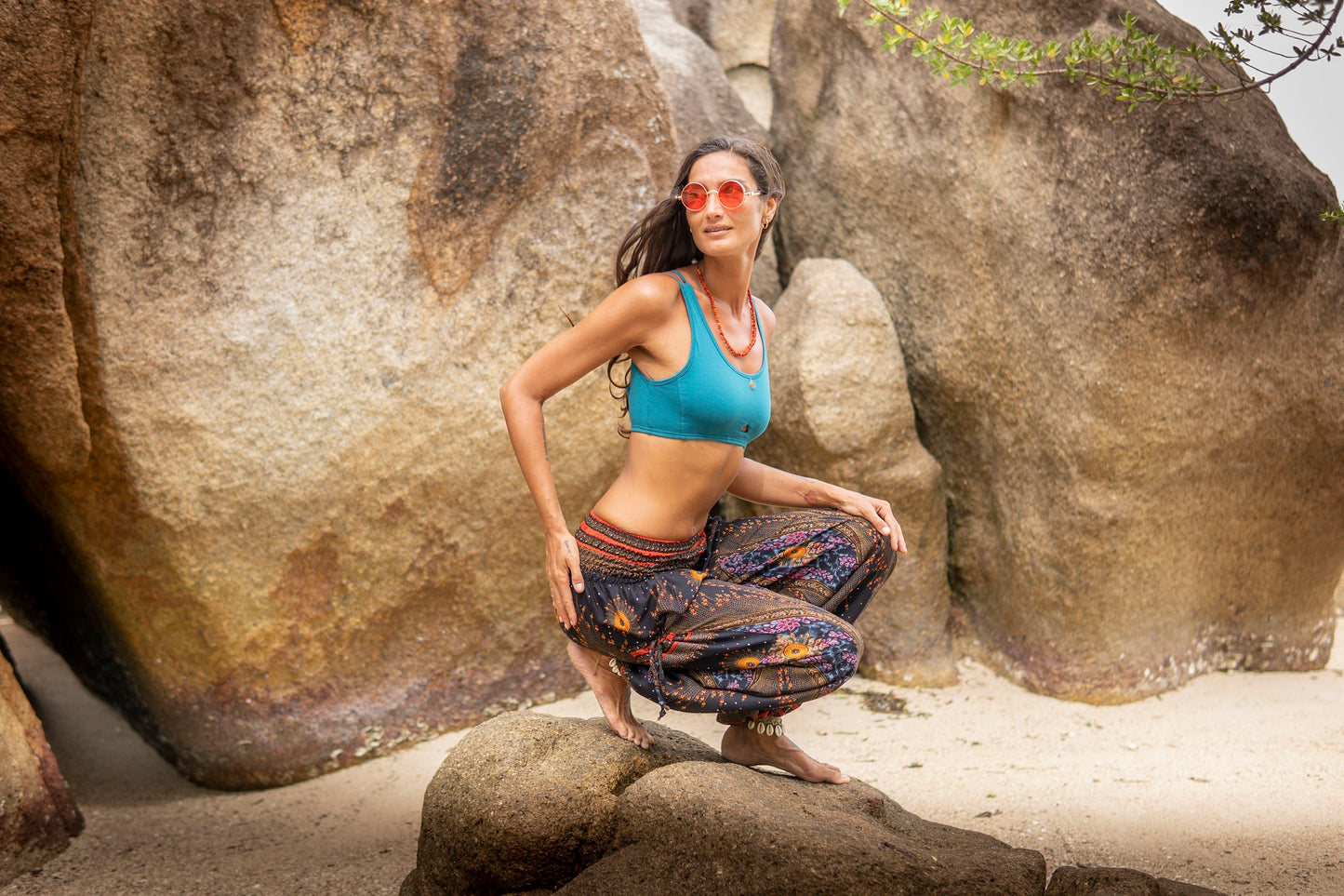 colorfully patterned harem pants with pockets in dark blue