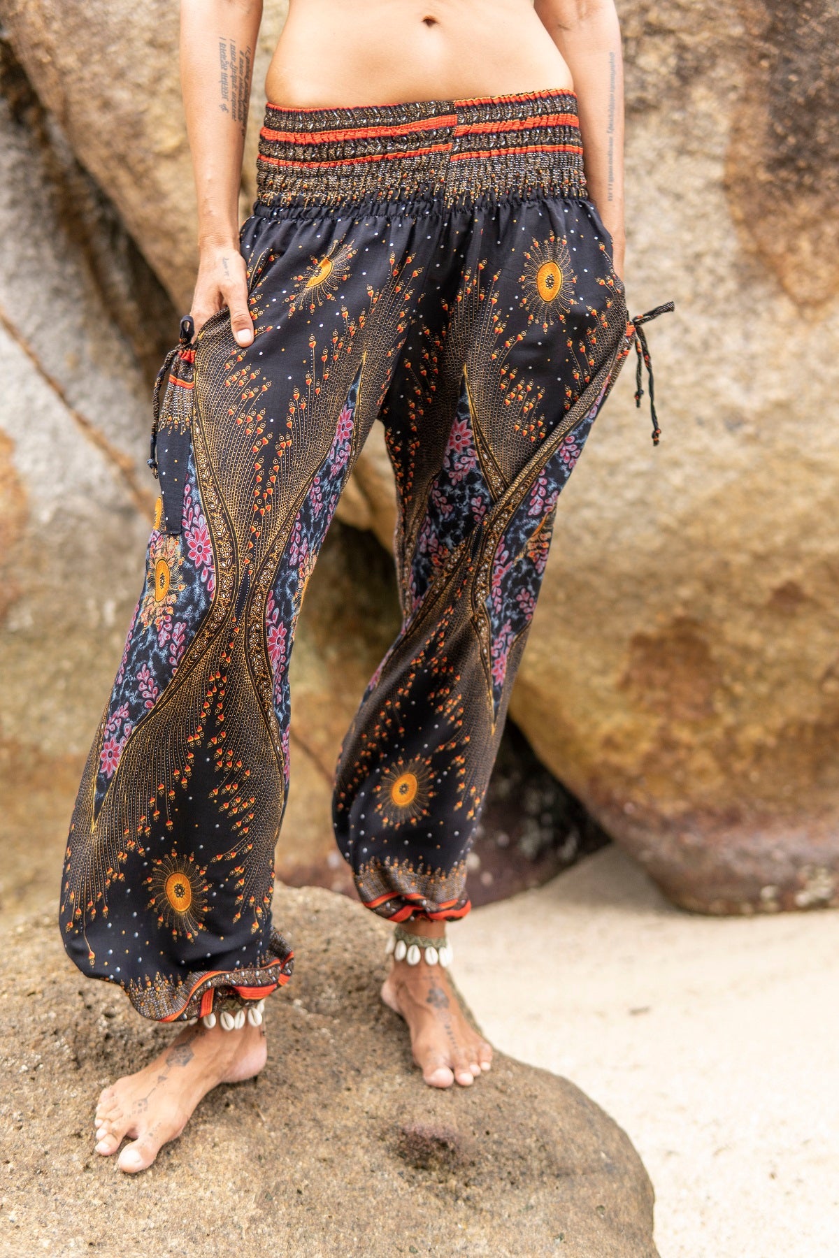 colorfully patterned harem pants with pockets in dark blue