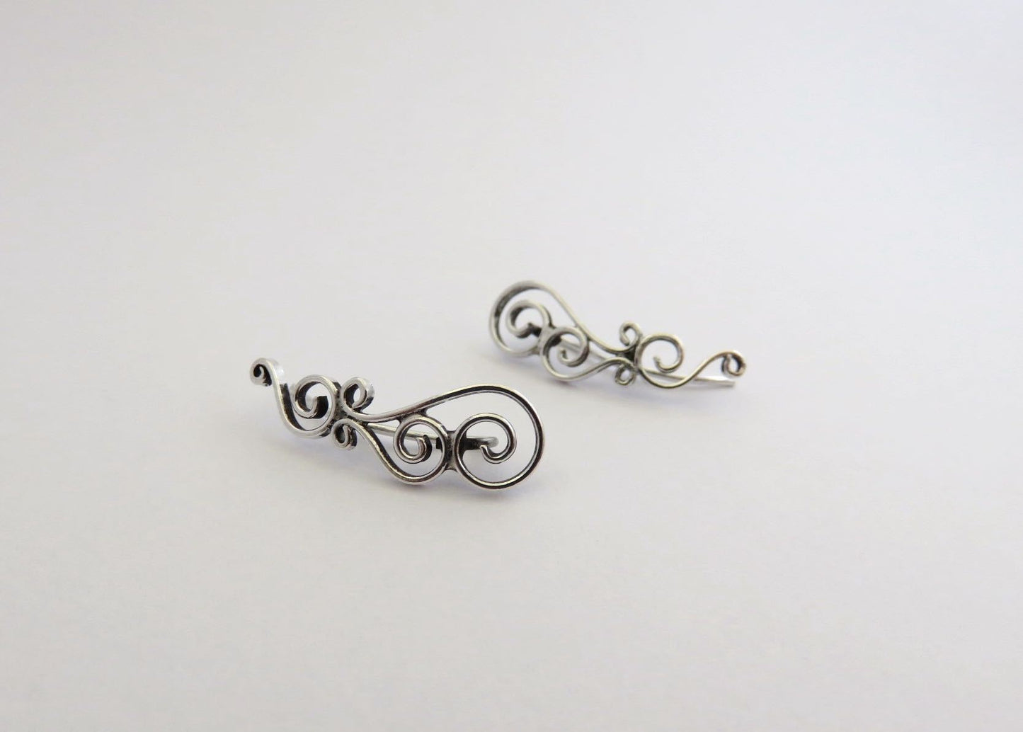 Earclimber earrings with silver spirals