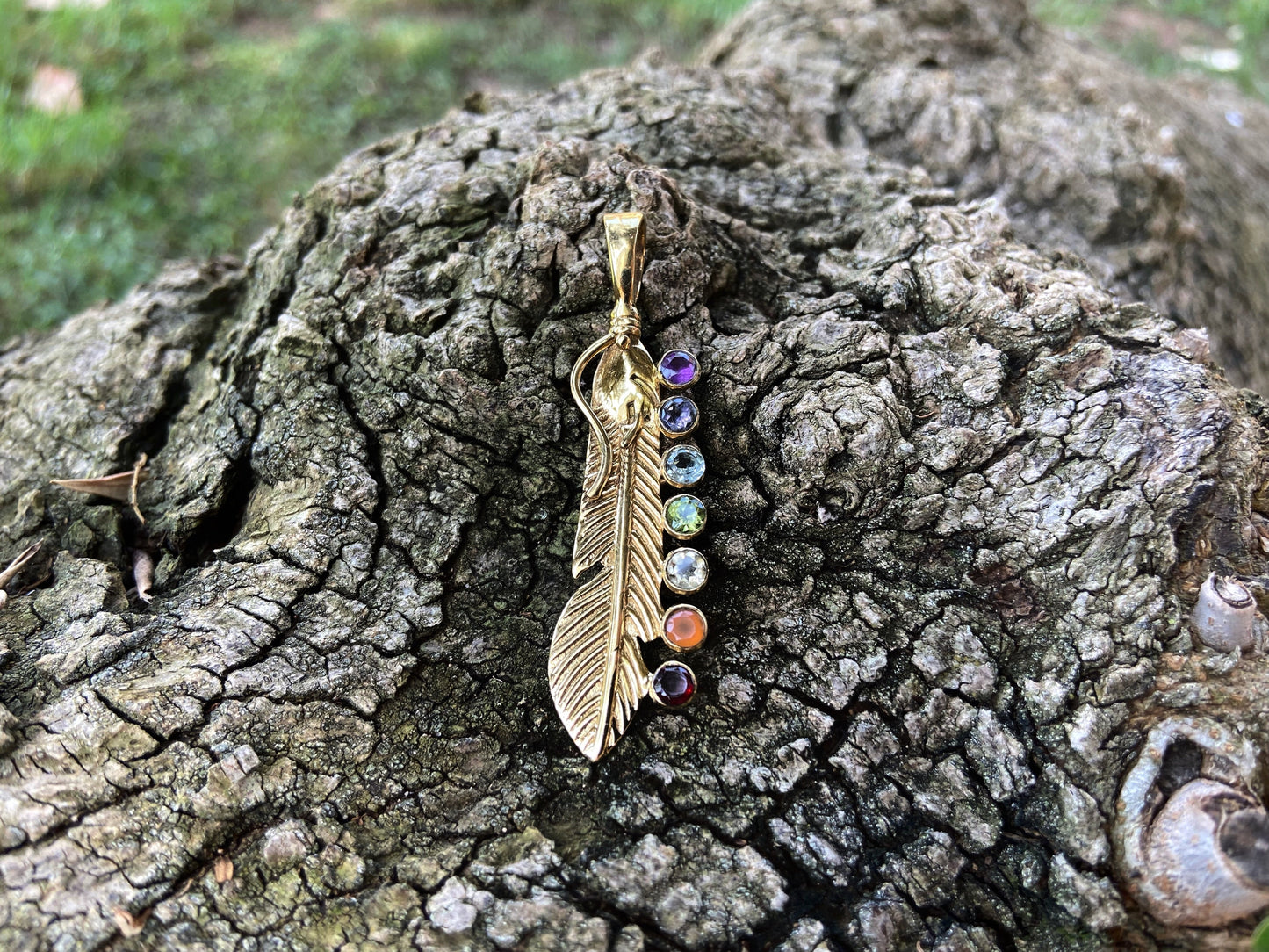 Chakra pendant feather made of brass with stones