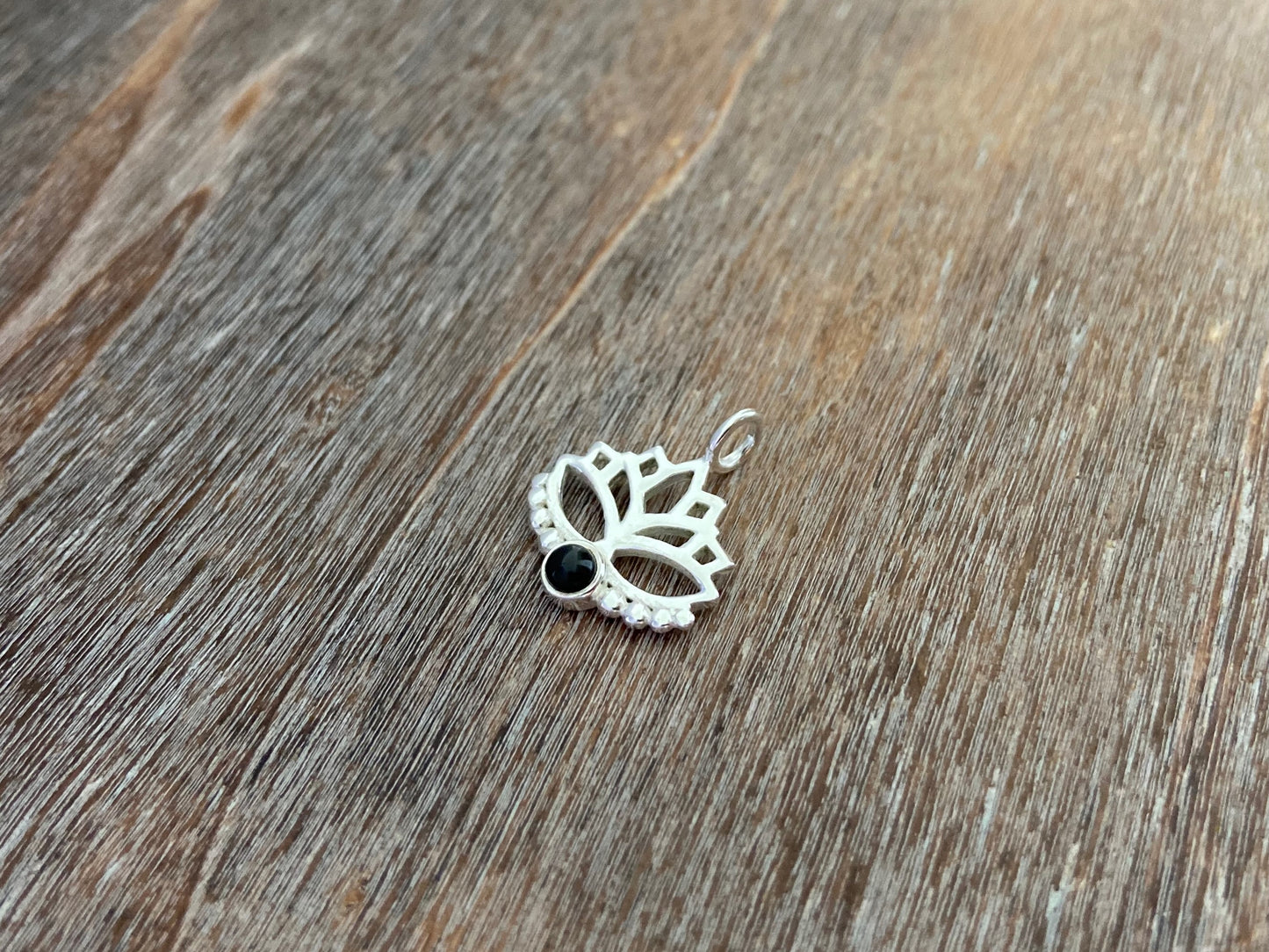 Lotus flower pendant with black onyx stone and silver dots