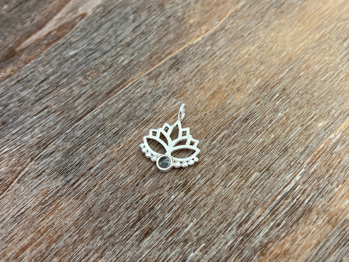 Lotus flower pendant with peridot stone and silver dots