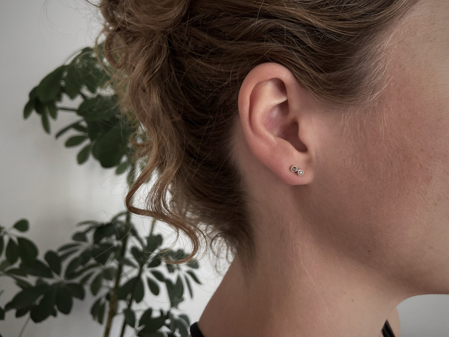 silver stud earrings with two small stones