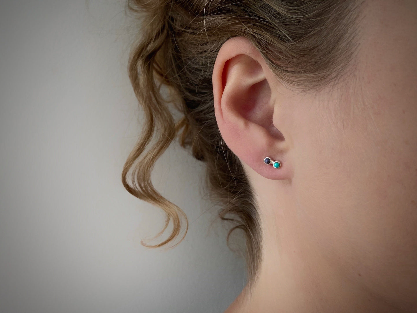silver stud earrings with two small stones