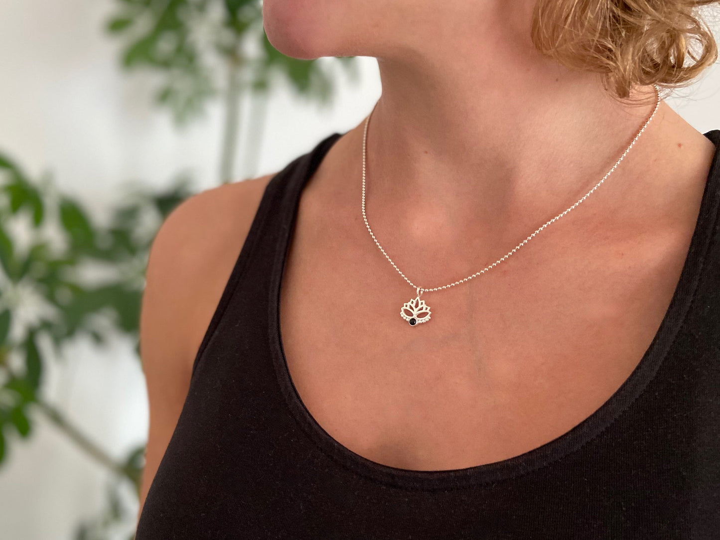 Lotus flower pendant with black onyx stone and silver dots