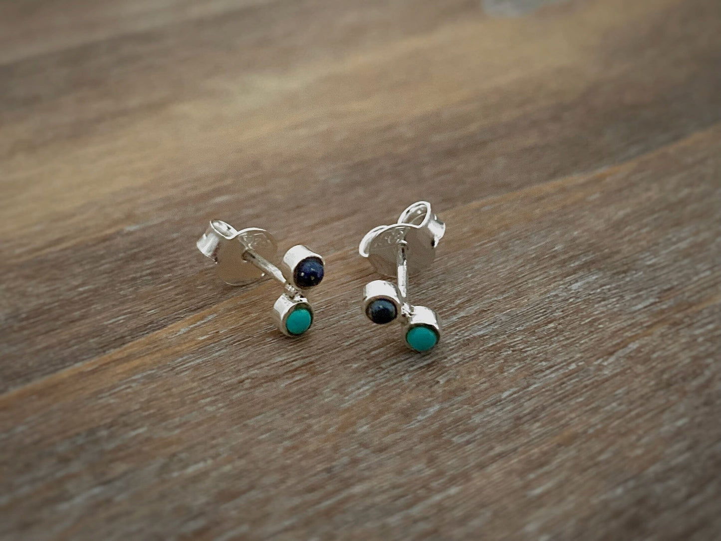 silver stud earrings with two small stones