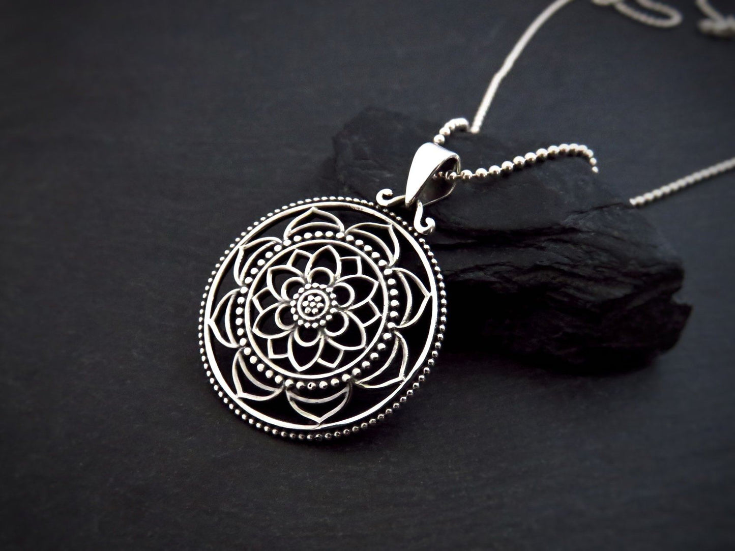 floral mandala pendant made of silver