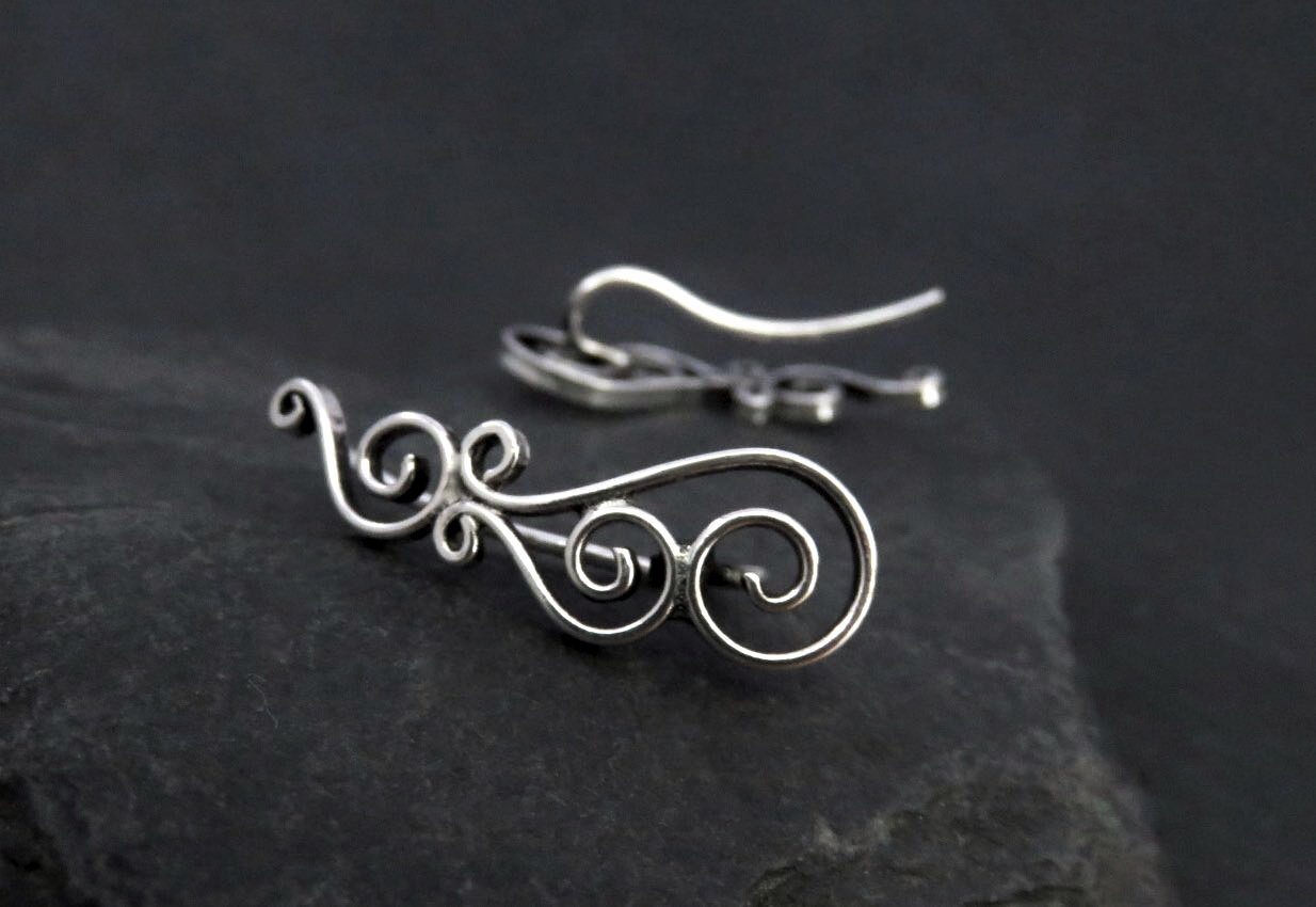 Earclimber earrings with silver spirals