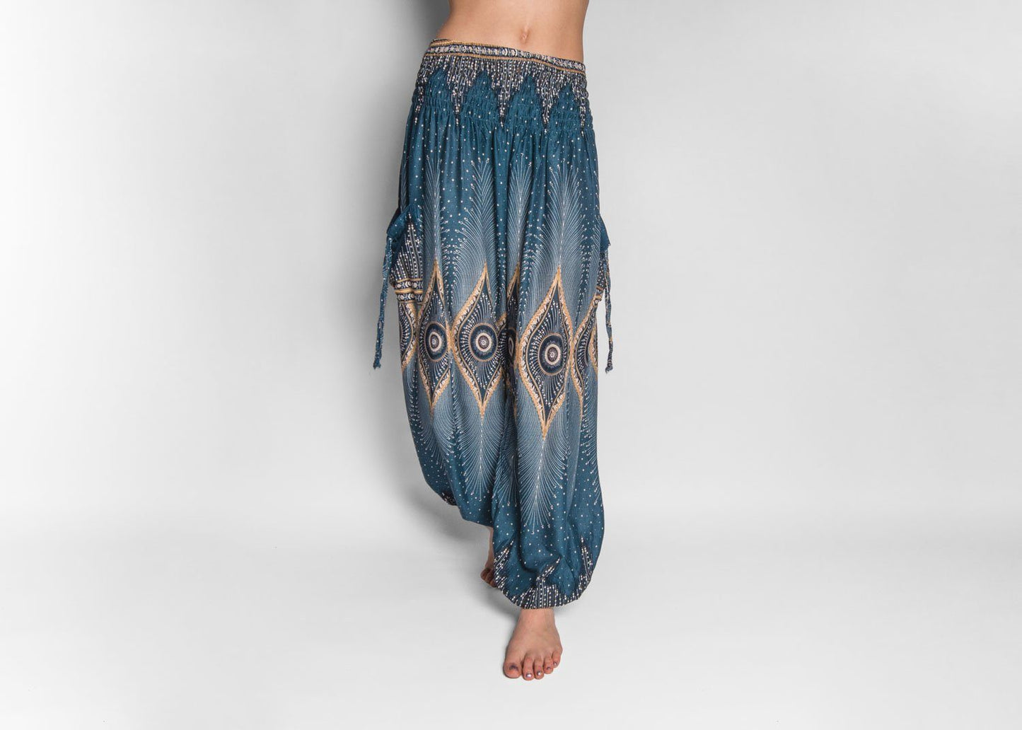 luftige Pluderhose mit Pfauenmuster in türkis