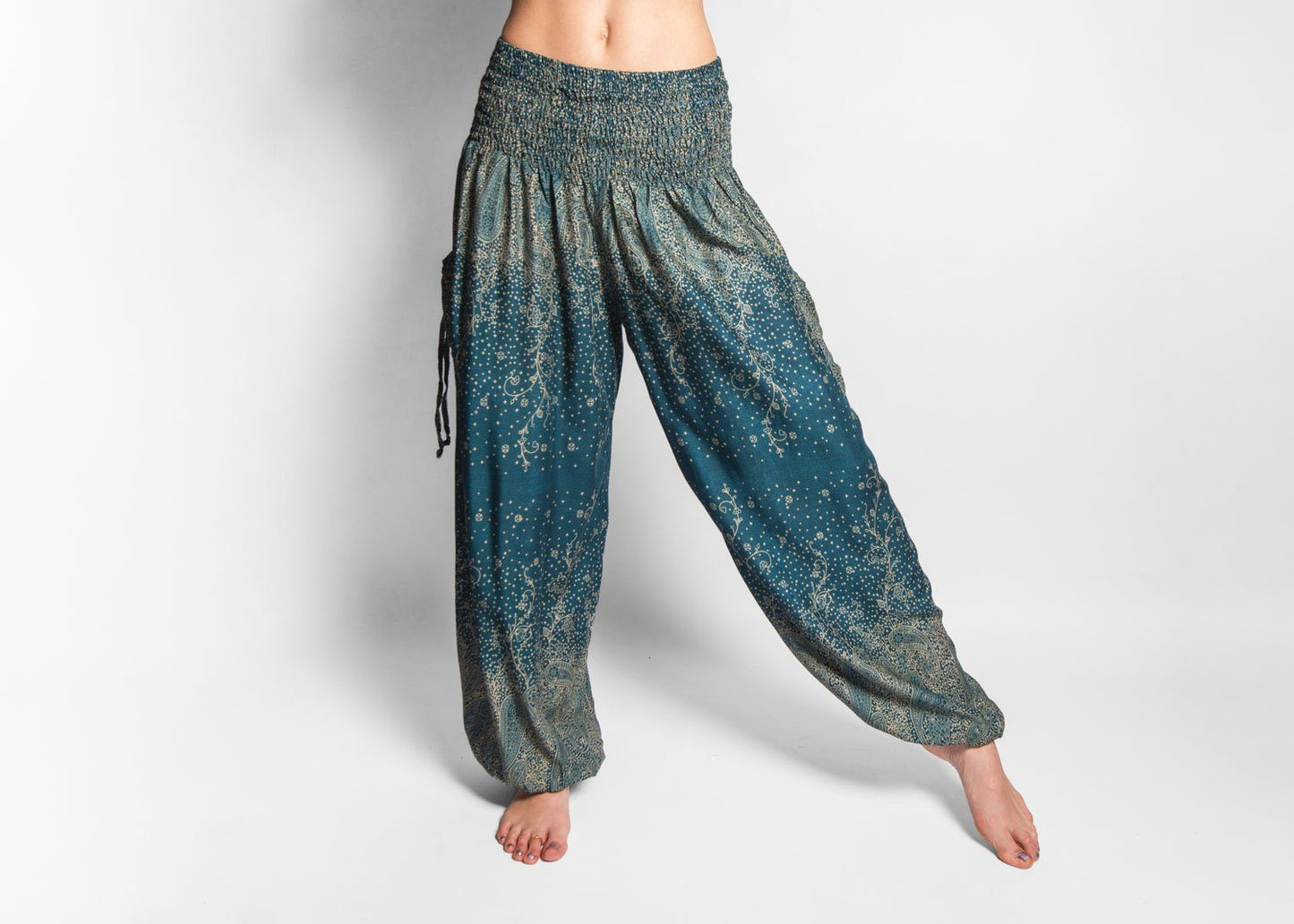 luftige Pluderhose mit floralem Muster in türkis mit Taschen