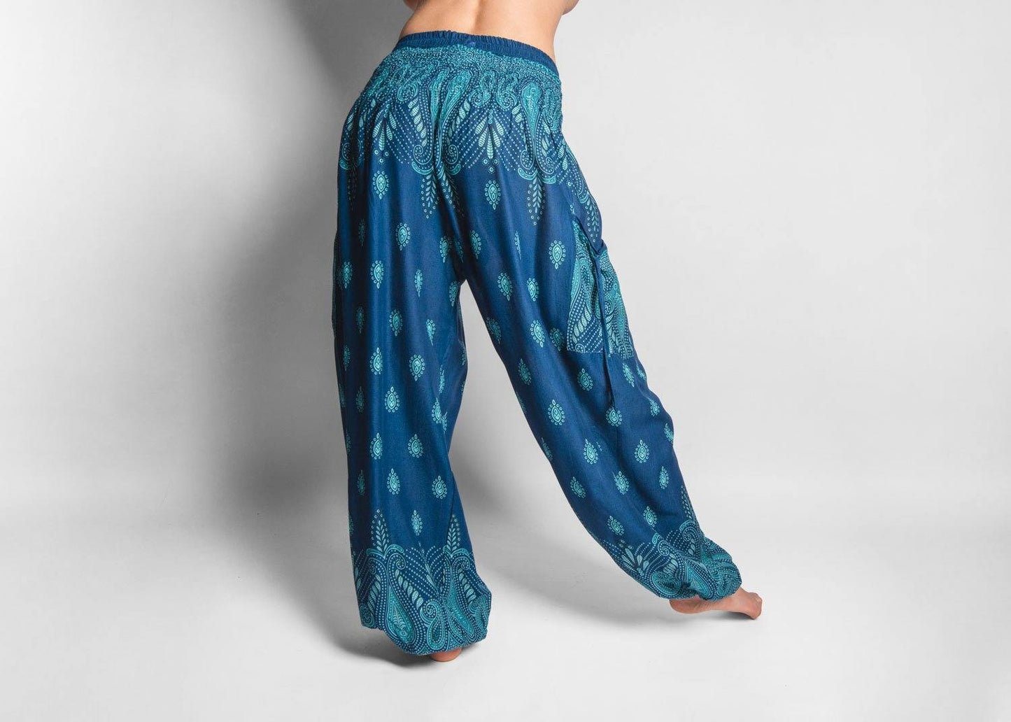 luftige gemusterte Pluderhose in türkis mit Taschen