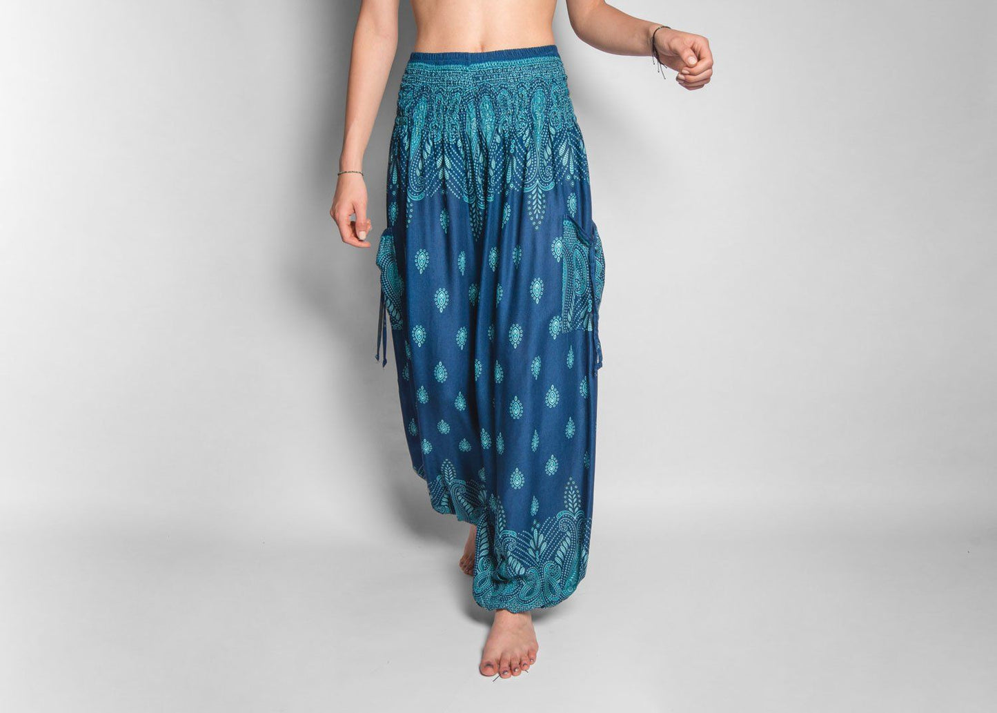 luftige gemusterte Pluderhose in türkis mit Taschen