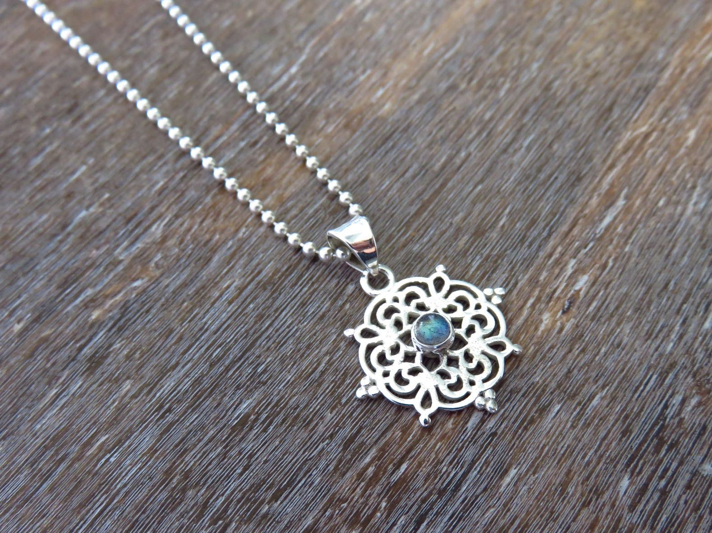 small filigree pendant with labradorite made of silver