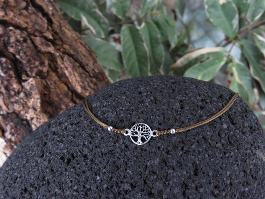 Bracelet with a small silver tree of life