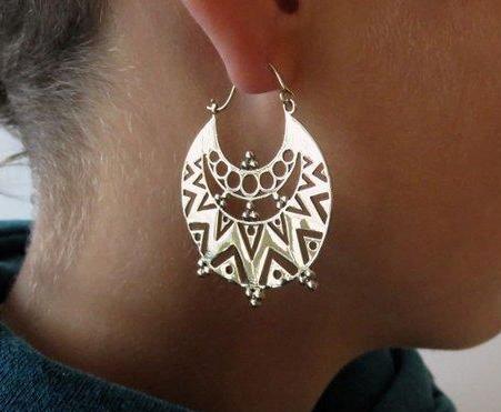 large hoop earrings with geometric patterns made of brass