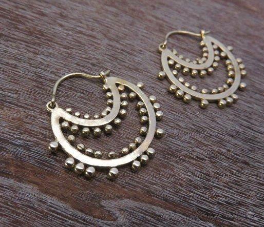 Hoop earrings decorated with brass dots
