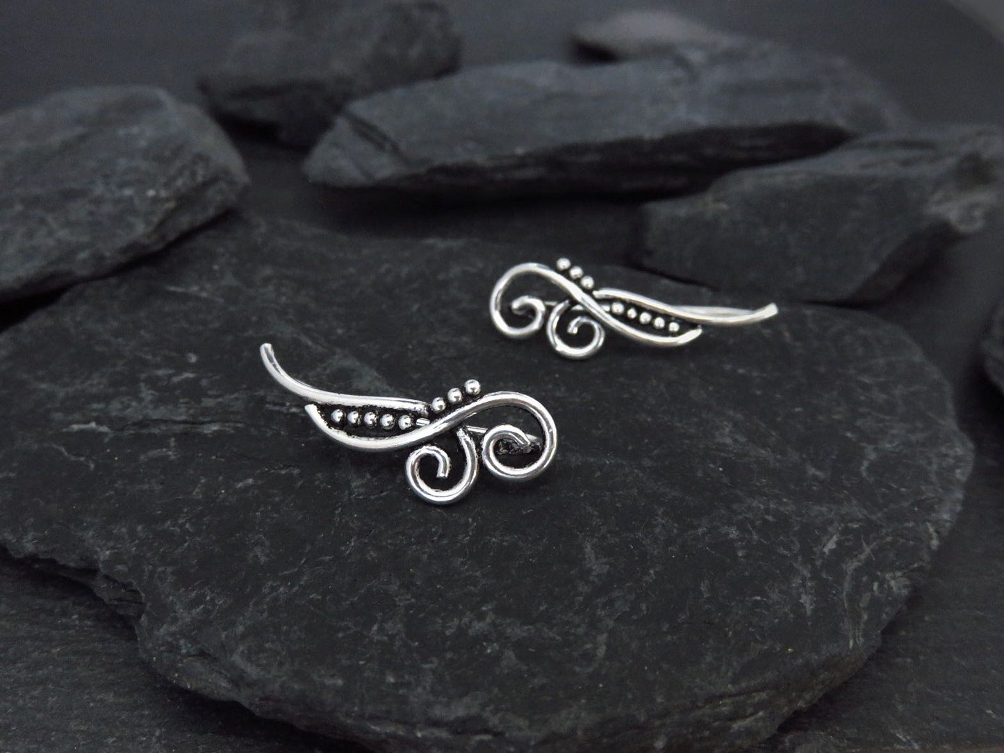 Earclimber earrings two spirals made of silver