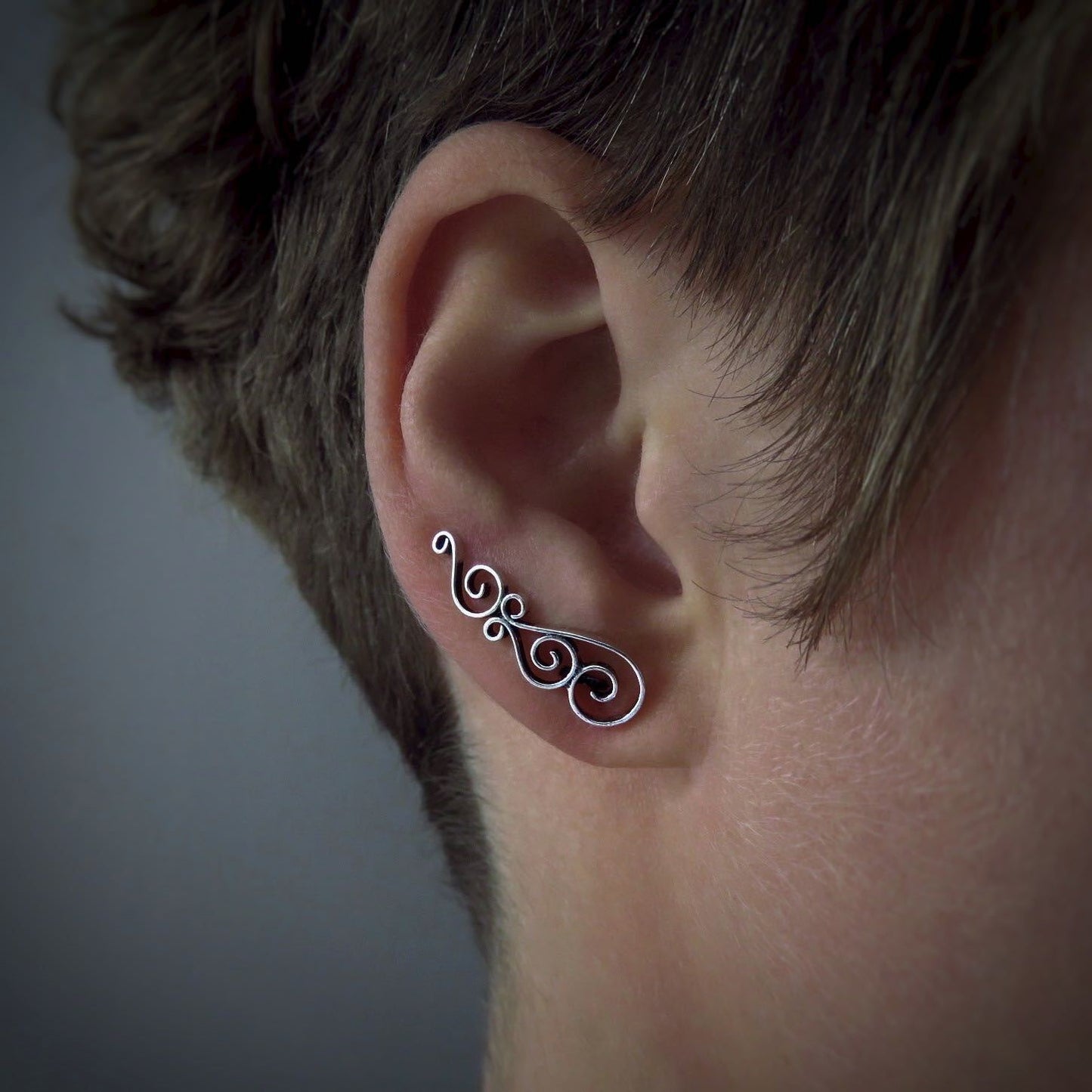 Earclimber earrings with silver spirals