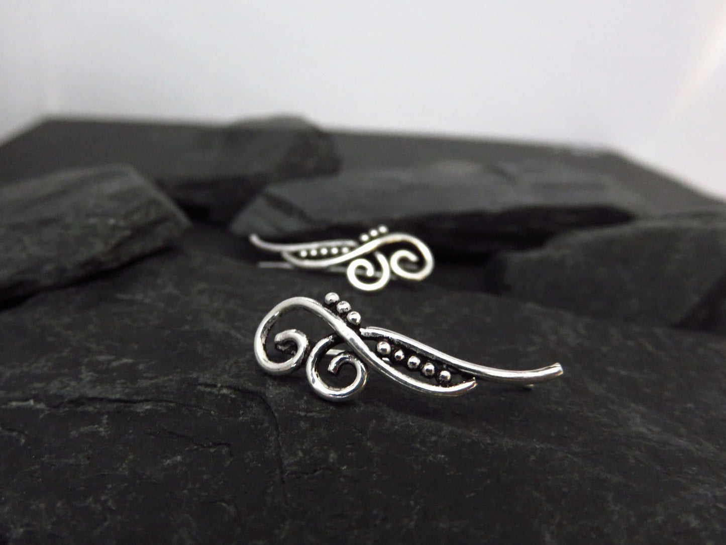 Earclimber earrings two spirals made of silver