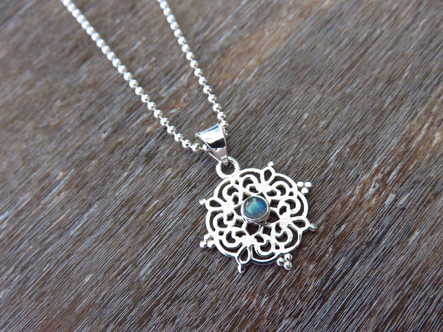 small filigree pendant with labradorite made of silver