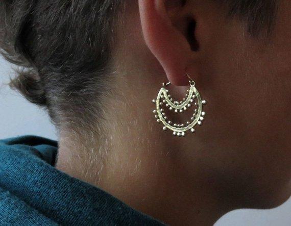 Hoop earrings decorated with brass dots