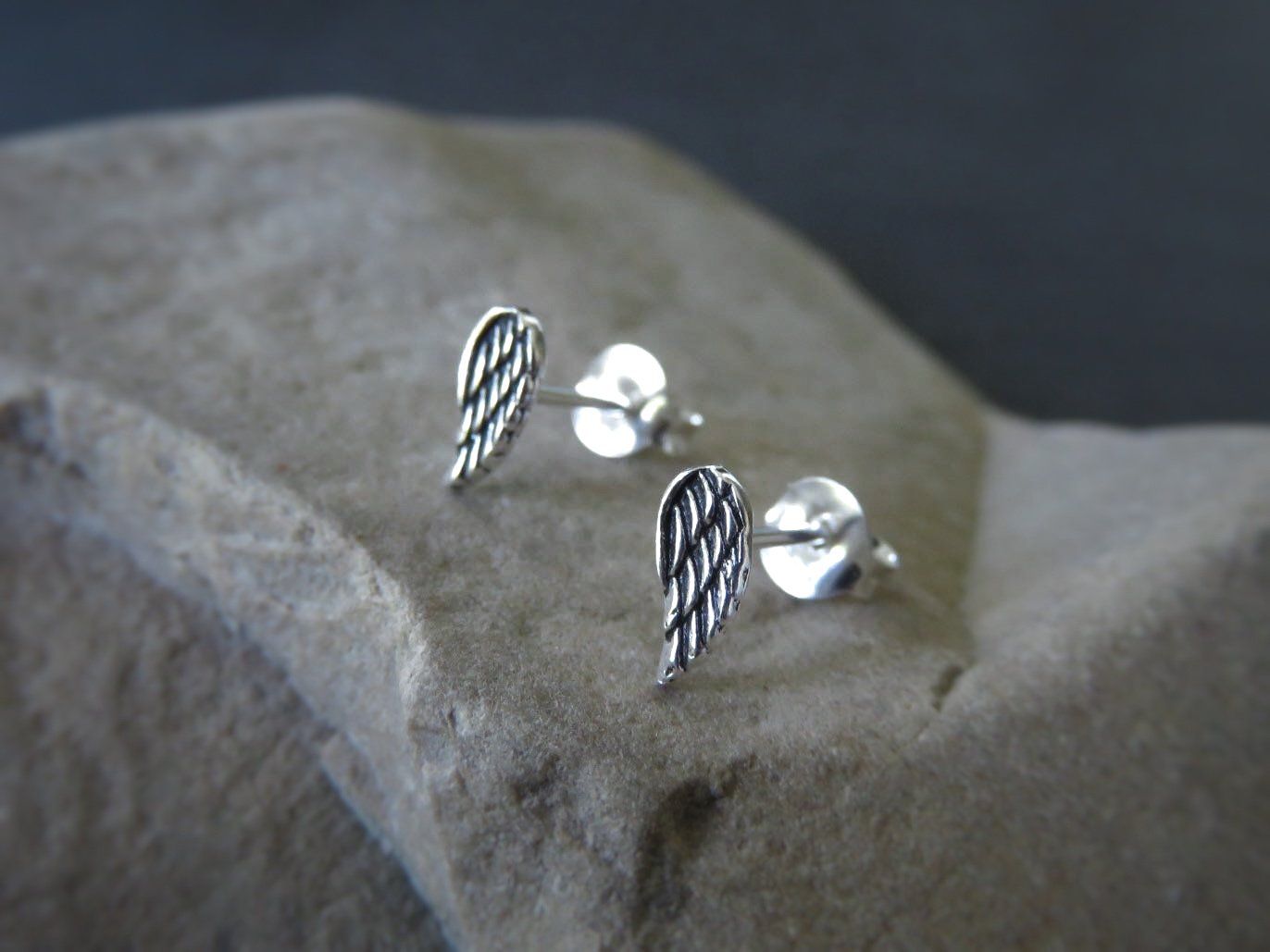 small angel wing stud earrings made of silver – Sanuka